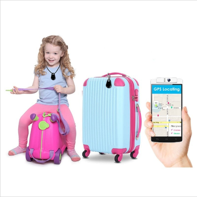 Child sitting on a pink and purple toy suitcase with a large blue suitcase next to it, and a hand holding a phone with GPS locating app.