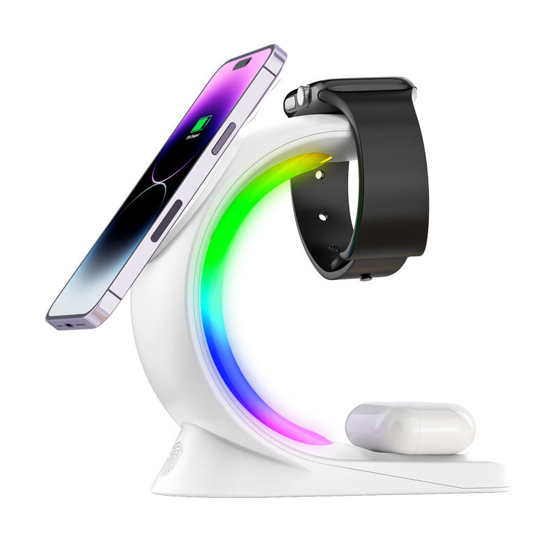 White wireless charging stand with smartphone, smartwatch, and mouse on a white background
