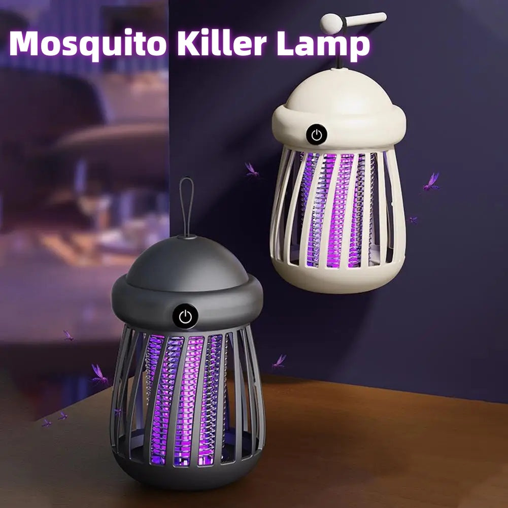 Two mosquito killer lamps on a table with a blurred background