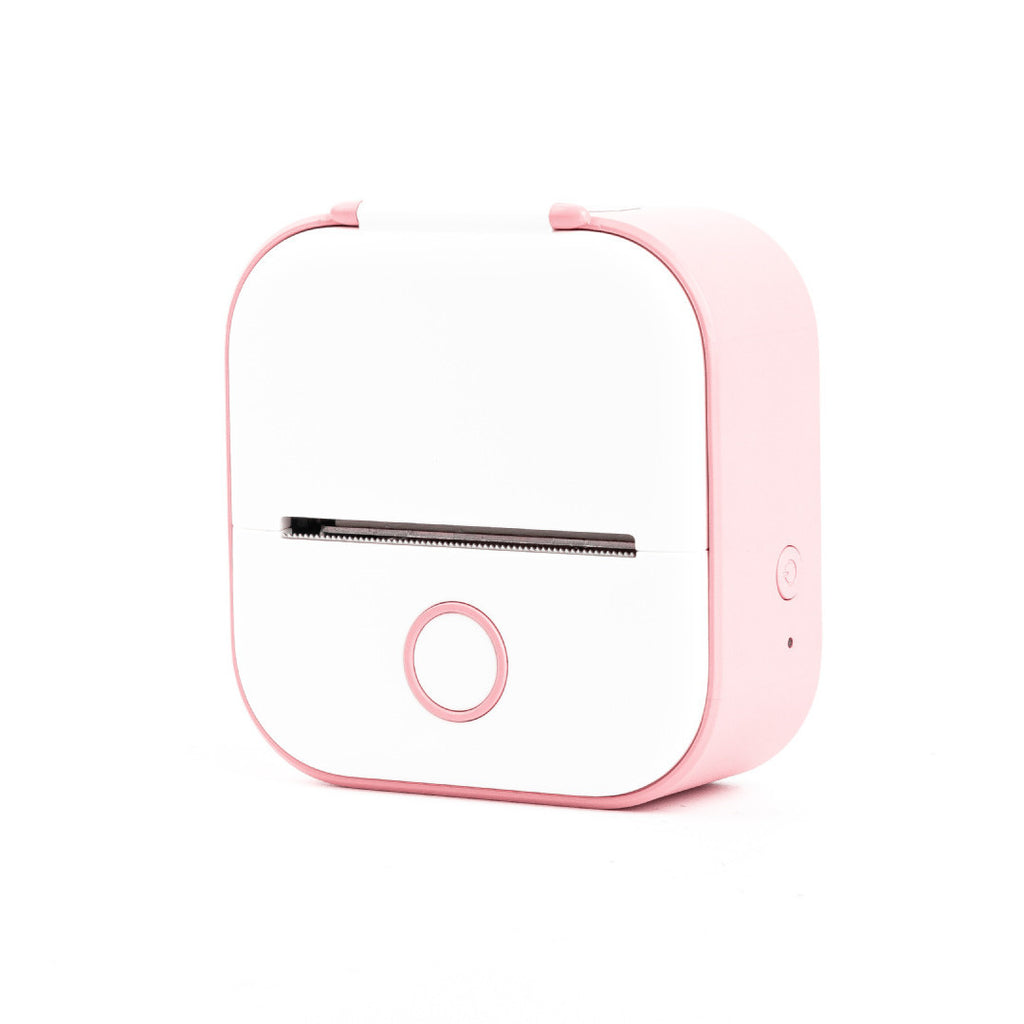 Pink and white electronic device on a white background